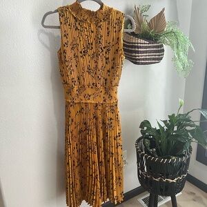 Floral Nanette Lepore Gold Sleeveless Sheath Dress with rouged waist. Size S
